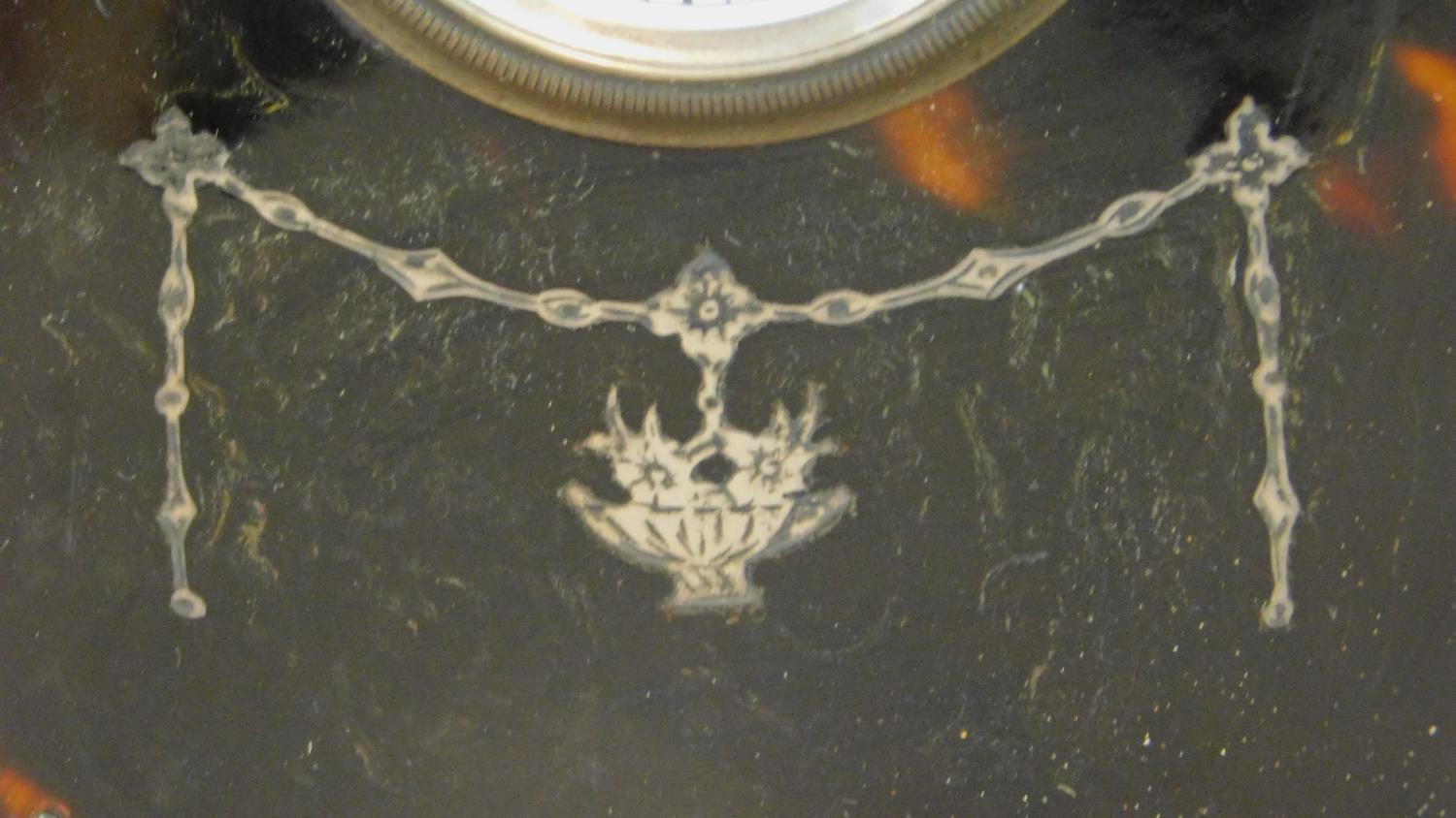 A tortoiseshell cased lancet shaped mantel clock with white metal swag inlay. Swiss made movement. - Image 4 of 7