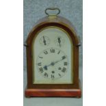 An antique Wurtemburg Westminster chime mahogany cased bracket clock. With brass carrying handle and