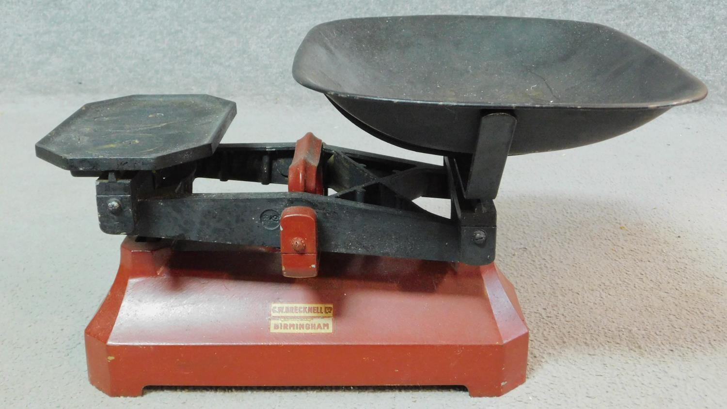 A set of C.W. Brecknell Ltd of Birmingham vintage red painted iron weighing scales with weights. - Image 2 of 4