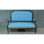 A 19th century French walnut canape in pale turquoise fabric painted upholstery. H.108 W.130 D.65cm