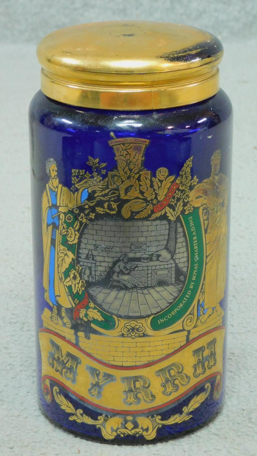 A Bristol Blue gilded glass Royal Pharmaceutical Society of Great Britain lidded Myrrh jar with