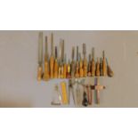 A collection of antique woodworking tools. Including a vintage Maples of Sheffield brass inlaid