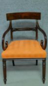 A William IV mahogany bar back armchair in tangerine stripe fabric painted upholstery with scroll