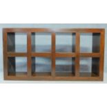 An Eastern teak open sideboard or standing bookcase. H.181 W.94 D.36cm