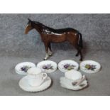 A collection of porcelain. Including a Beswick horse, Royal Worcester coasters with a floral