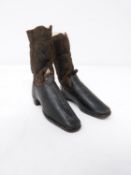 A pair of 18th century apprentice made black leather and brown suede heeled boots. Leather soles,