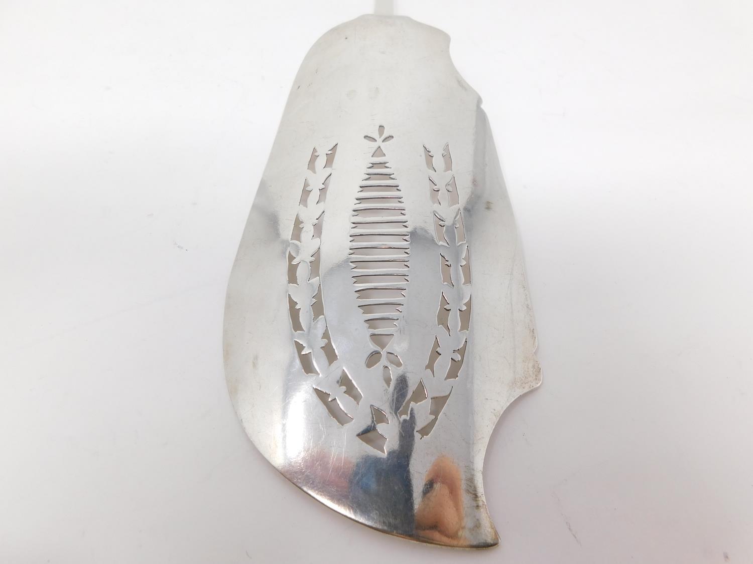 A collection of silver cutlery. Inlcuding a Georgian pierced foliate design fish slice, - Image 9 of 17