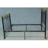 A Victorian brass and iron bedstead with inset cut glass panels, to take a 4ft 6in mattress.