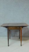 A 19th century mahogany drop flap Pembroke table on square tapering supports with spade feet. H.67