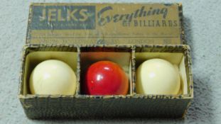 Three antique ivory billiard balls by W. Jelks & Sons Ltd of Holloway Road, London. In their