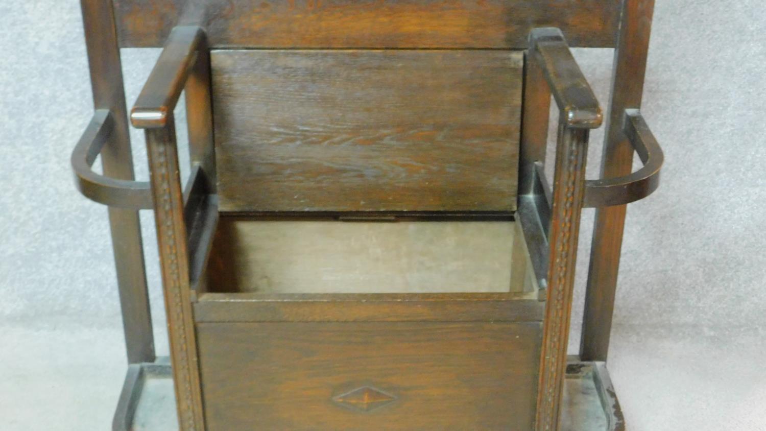 An antique style oak hallstand fitted with mirror above box seat with lift up top enclosing shoe - Image 3 of 5