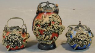 Three 20th century Chinese moulded painted resin stone effect urn and two small teapots. Decorated