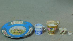 A miscellaneous collection of porcelain items. Including an antique hand painted porcelain patch