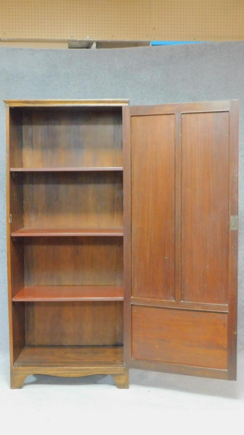 A vintage teak hall cupboard with panel door enclosing shelves on bracket feet. H.176 W.76 D.51cm - Image 3 of 5