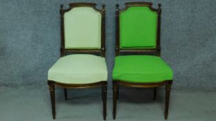 A pair of 19th century French walnut dining chairs in olive and shamrock green fabric painted
