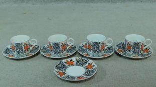 A Japanese floral design porcelain tea set, artist's signature to the base. Decorated with Camelia