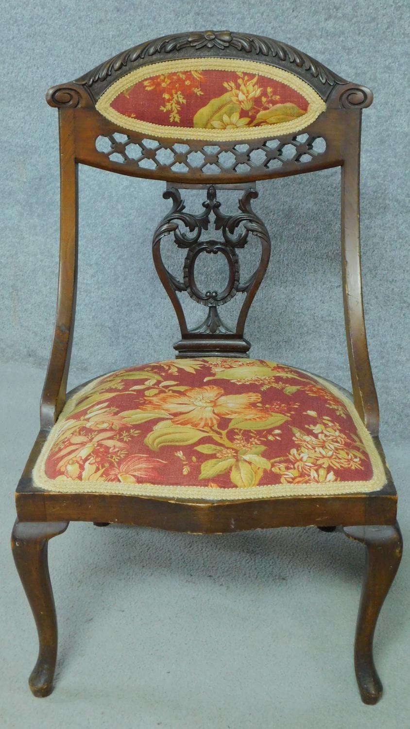 An Edwardian mahogany nursing chair with rouge floral upholstery and carved back on cabriole - Image 2 of 11