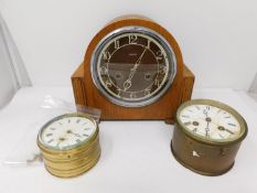 An rt Deco style oak cased electric Enfield mantle clock and and two antique brass circular ships