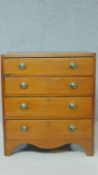 A Georgian mahogany chest of four graduating drawers of compact size on bracket feet. H.81 W.71 D.