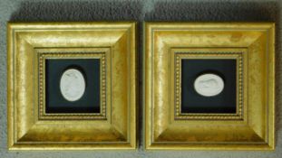 Two gilt framed plaster intaglio seals. One of a lion reclining on a rectangular plinth and a