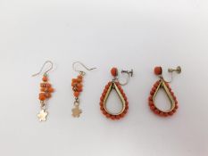 Two pairs of coral drop earrings. One set in gilt metal with a drop shape and coral bead detailing