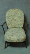 A vintage Ercol beech framed Windsor armchair with fauna & flora design fabric upholstered seat