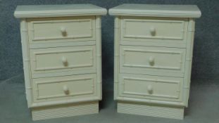 A pair of lacquered bedside chests with faux bamboo decoration. H.71 W.55 D.48cm