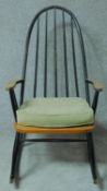A painted beech framed Ercol style rocking chair. H.107cm