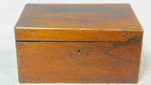 A 19th century rosewood jewellery box with fitted tray, red velvet interior and bird's eye maple