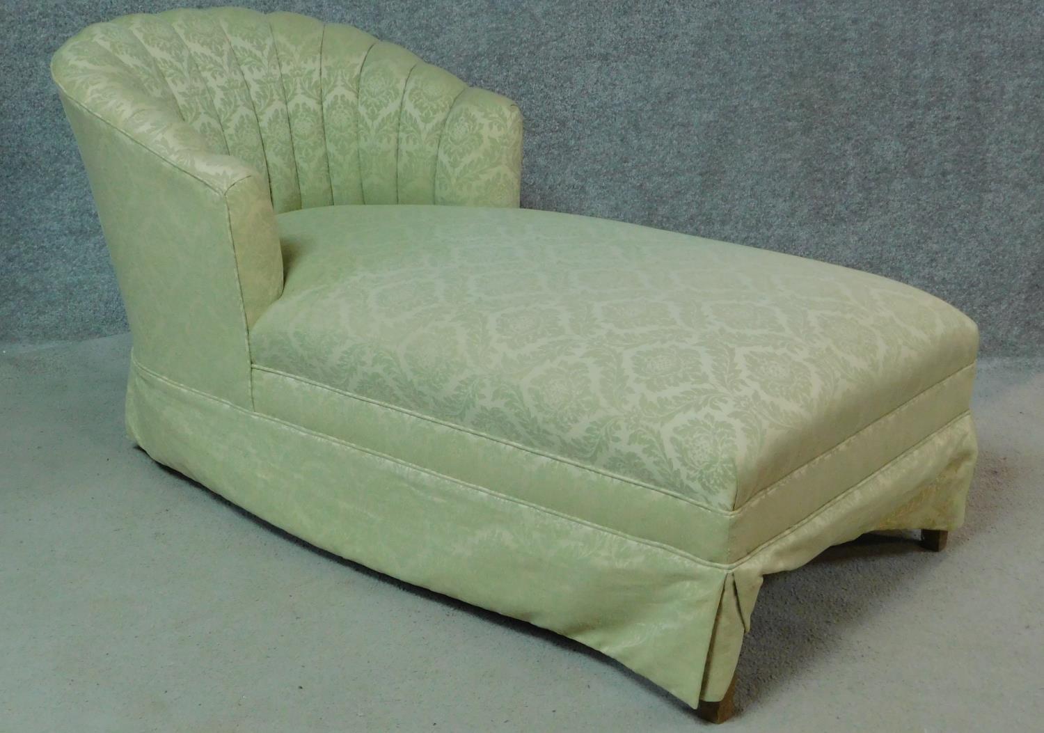 A mid 20th century day bed in scalloped pale jade damask upholstery. H.70 W.125 D.65cm