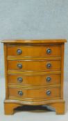 A 20th century mahogany small chest of four drawers on bracket feet. H.54 W.42 D.33cm