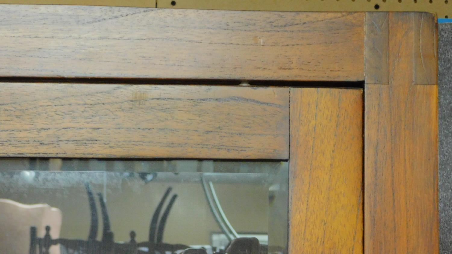 A large Eastern teak library bookcase with glazed sliding doors to the upper section above base - Image 4 of 7