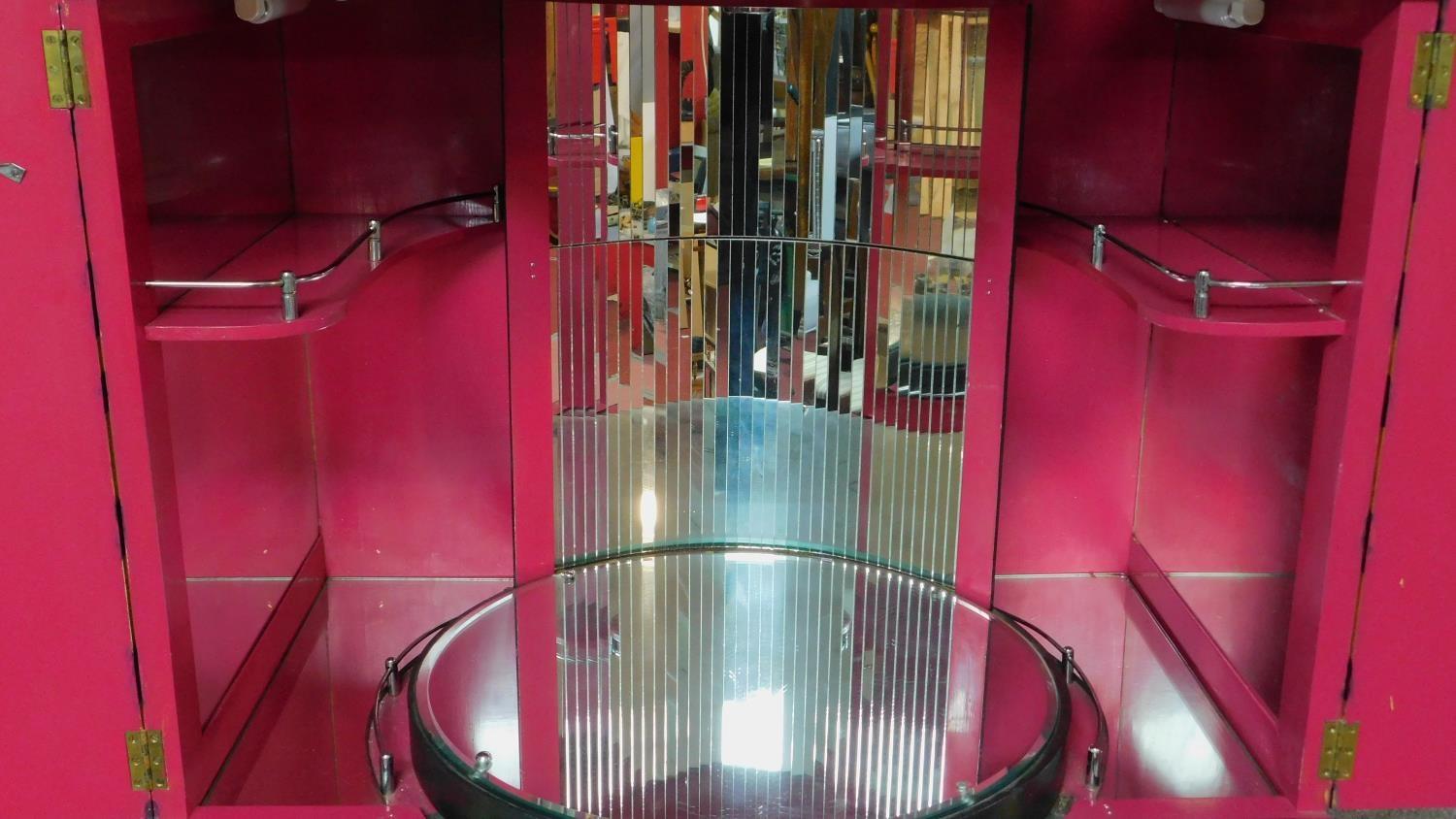 A mid 20th century drinks cabinet fitted revolving glazed interior with customization by famous - Image 4 of 8