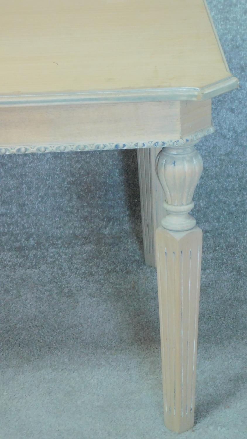A Louis XVI style painted pine coffee table on square tapering fluted supports. H.52 W.120 D.70cm - Image 3 of 3