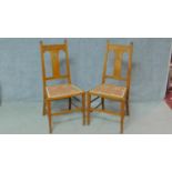 A pair of late 19th century oak Art Nouveau style bedroom chairs. H.102cm