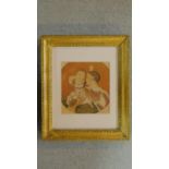 A carved gilt wood framed and glazed antique hand coloured print of a mother and child and their