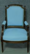 A 19th century French walnut armchair in sky blue fabric painted upholstery. H.97cm