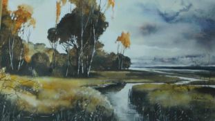 A framed and glazed watercolour, river in a landscape, signed. 70x63cm