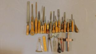 A collection of antique woodworking tools. Including a vintage Maples of Sheffield brass inlaid