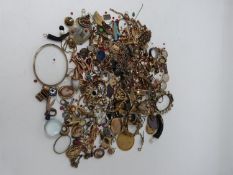 Collection of scrap jewelry. Including various fittings, earrings, gemstones and pendants.