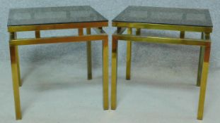 A pair of vintage Maison Jansen style brass framed lamp tables with plate glass inset tops. H.47 W.