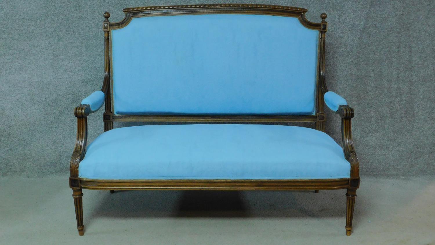A 19th century French walnut canape in pale turquoise fabric painted upholstery. H.108 W.130 D.65cm
