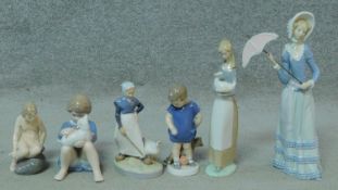 A miscellaneous collection of six porcelain figures, Lladro and Royal Copenhagen. H.32cm (tallest)