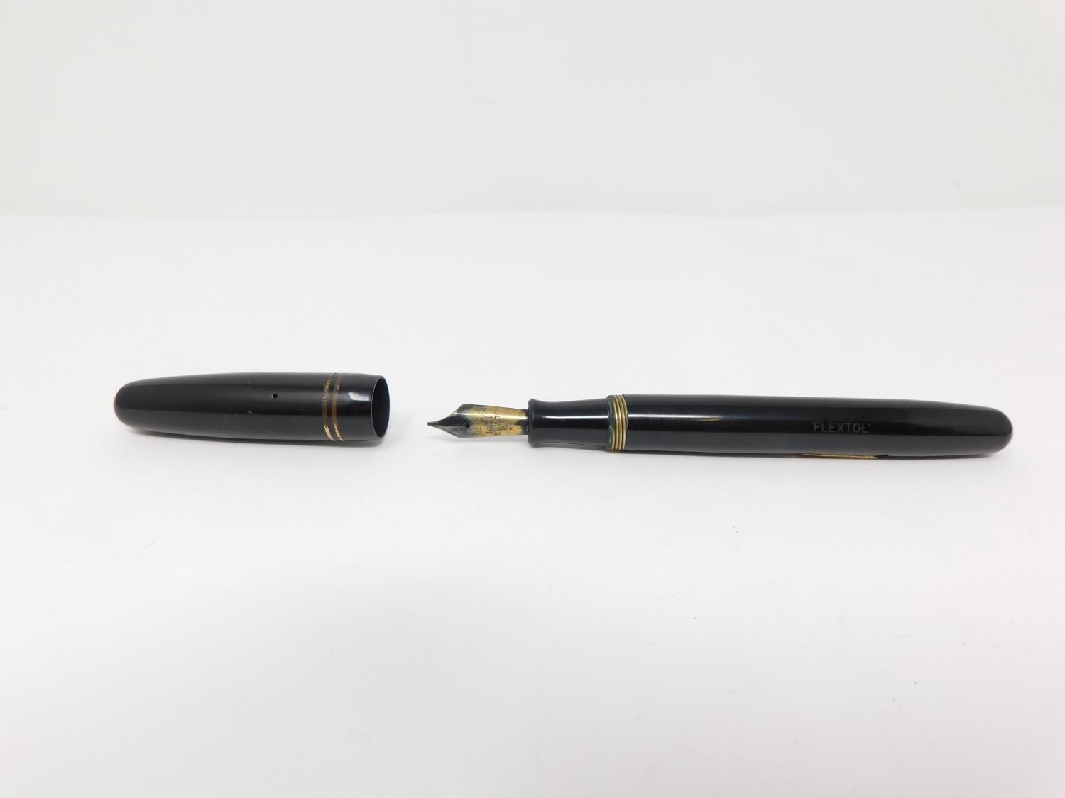 Two vintage fountain pens and a leather effect cased pair of compasses. One pen is a Parker - Image 13 of 18