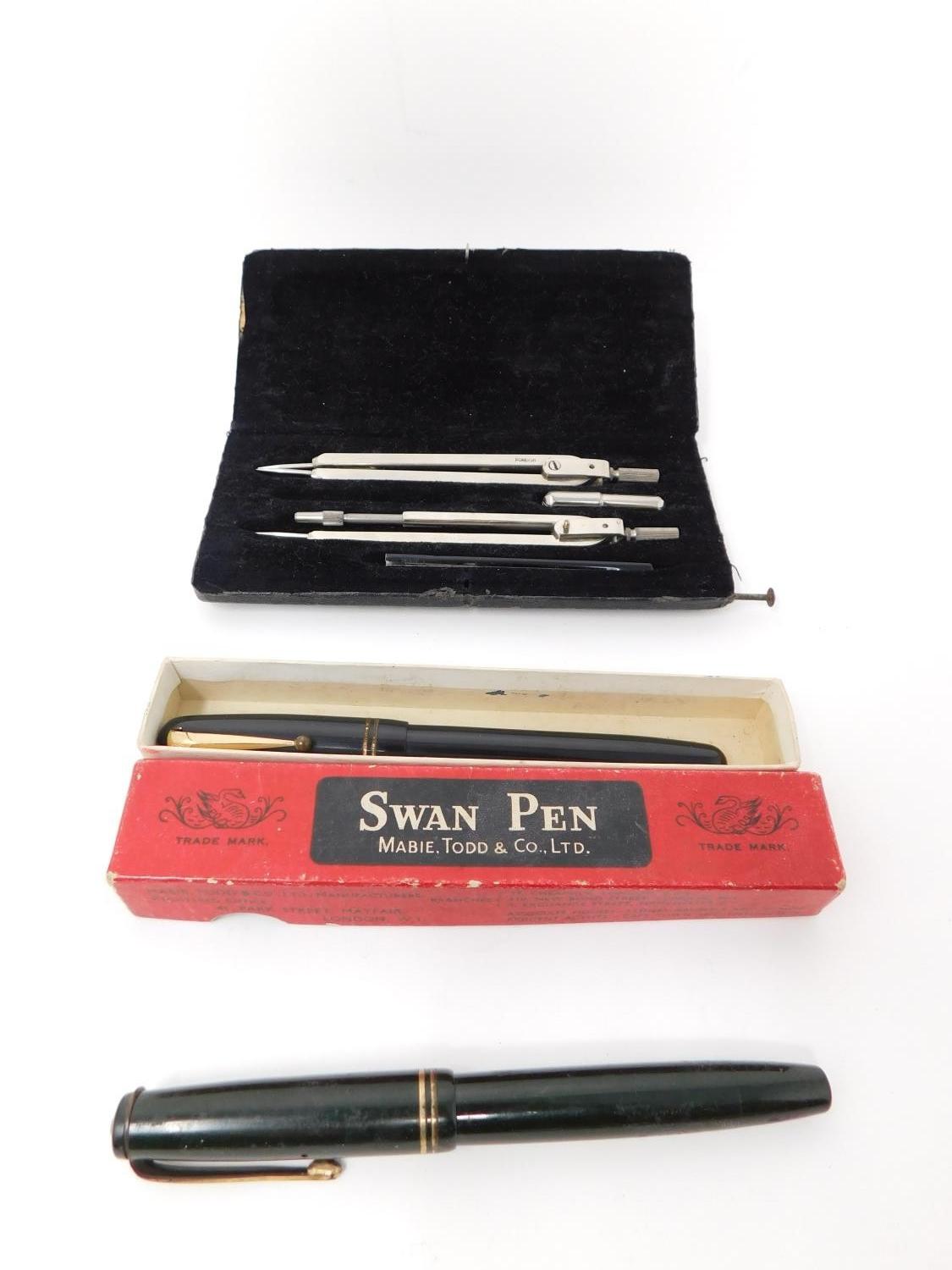 Two vintage fountain pens and a leather effect cased pair of compasses. One pen is a Parker