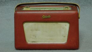 A mid century vintage Robert's portable radio on swivel base. H.18 W.28 D.11cm