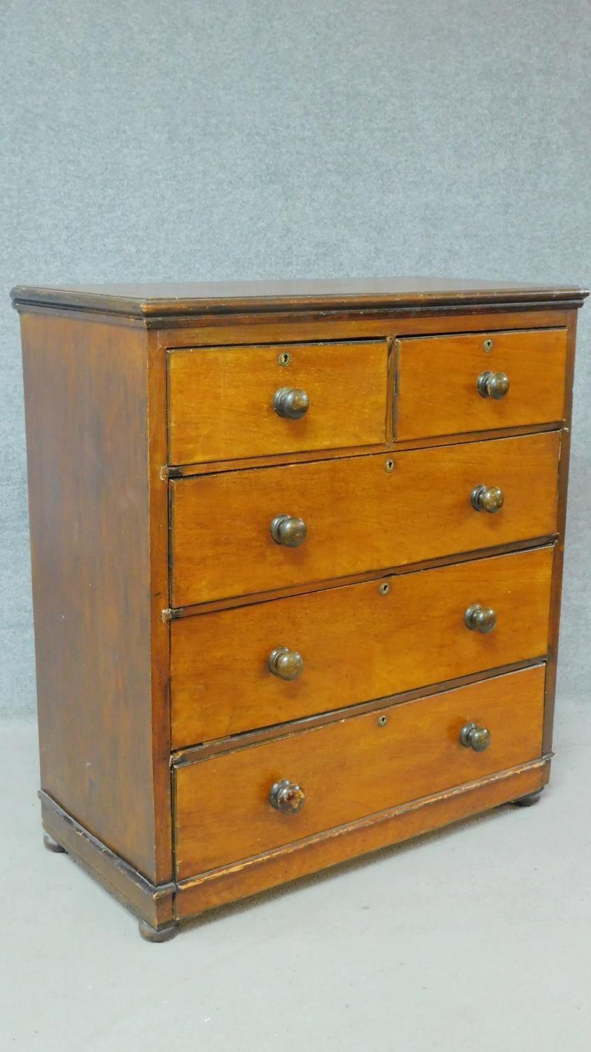 A 19th century mahogany chest of two short over three long drawers on plinth base. H.107 W.96 D.49cm - Image 2 of 5