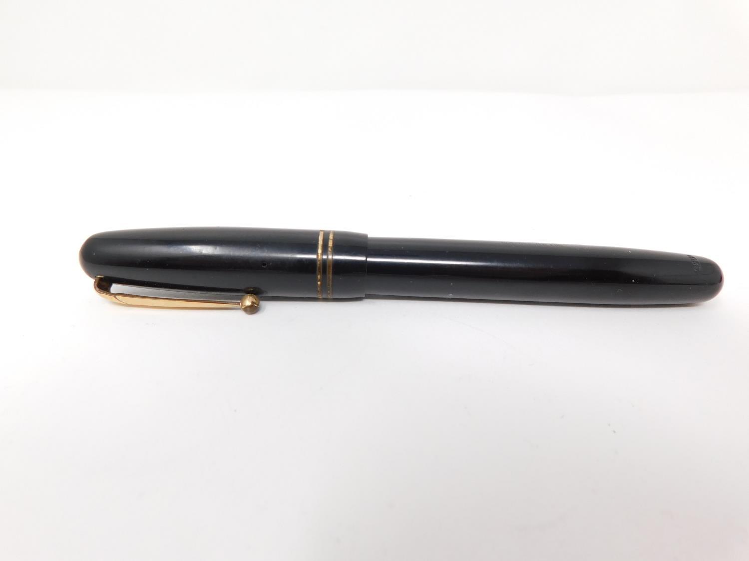 Two vintage fountain pens and a leather effect cased pair of compasses. One pen is a Parker - Image 11 of 18