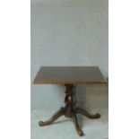A Victorian style stained pine occasional table on quadruped cabriole supports. H.75 W.90 D.90cm