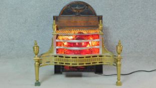 An electric hearth fire in the form of a Regency fire basket with andirons. H.64 W.71 D.31cm